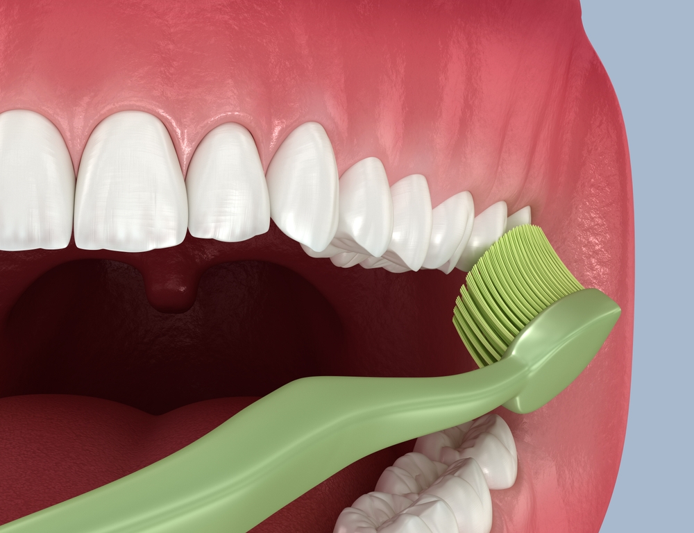 365디지털치과-둔산동네비게이션치과-임플란트 후 구강청결을 위해 치아를 닦는 이미지